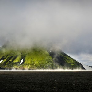 Maelifell covered in Clouds and Mist Morning Sun